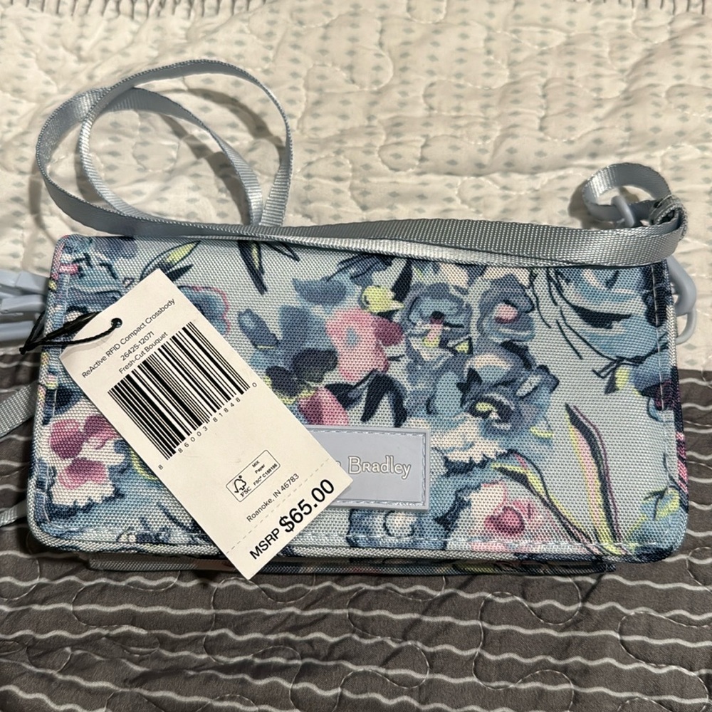 Vera Bradley compact crossbody bag in Fresh-cut bouquet.